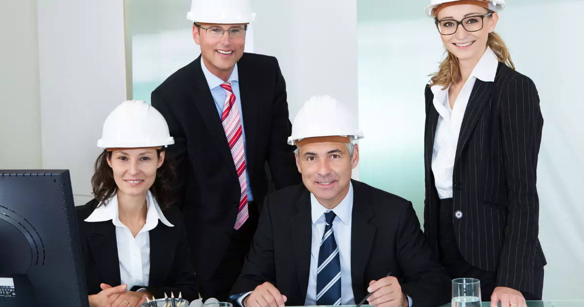 A group of people wearing hard hats