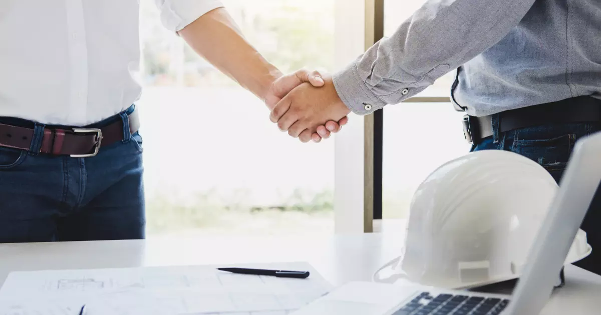Contractor marketing services partnership handshake
